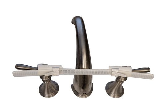 EXT.- Tub:  Faucet Handle Restraint